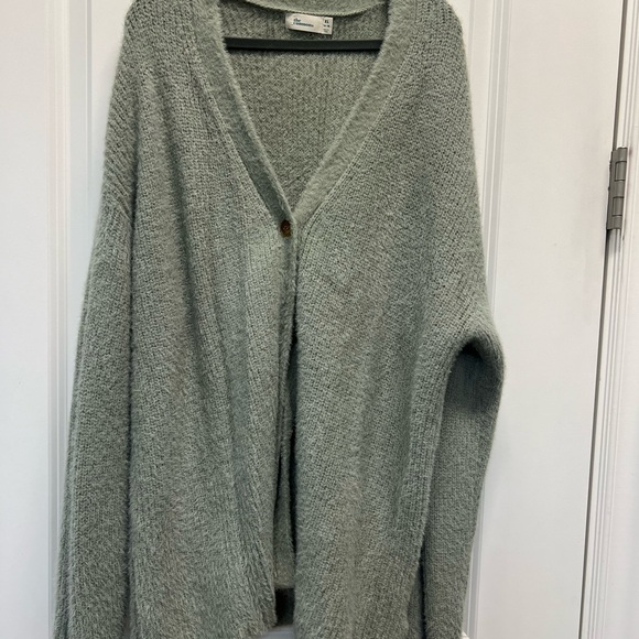 Like new! Super soft light green cardigan! Brown buttons on the front. - Picture 1 of 3